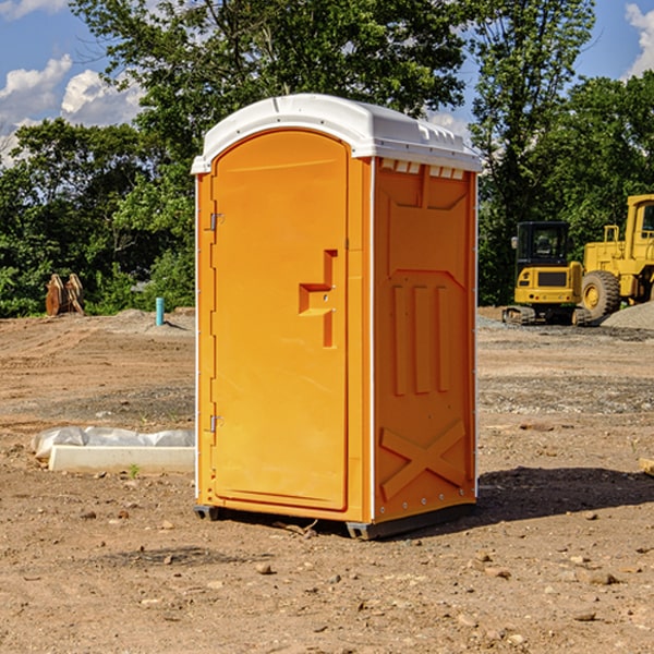 how often are the portable toilets cleaned and serviced during a rental period in Dawson County